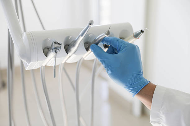 Professional Tooth Extraction technician working in Falls City, NE